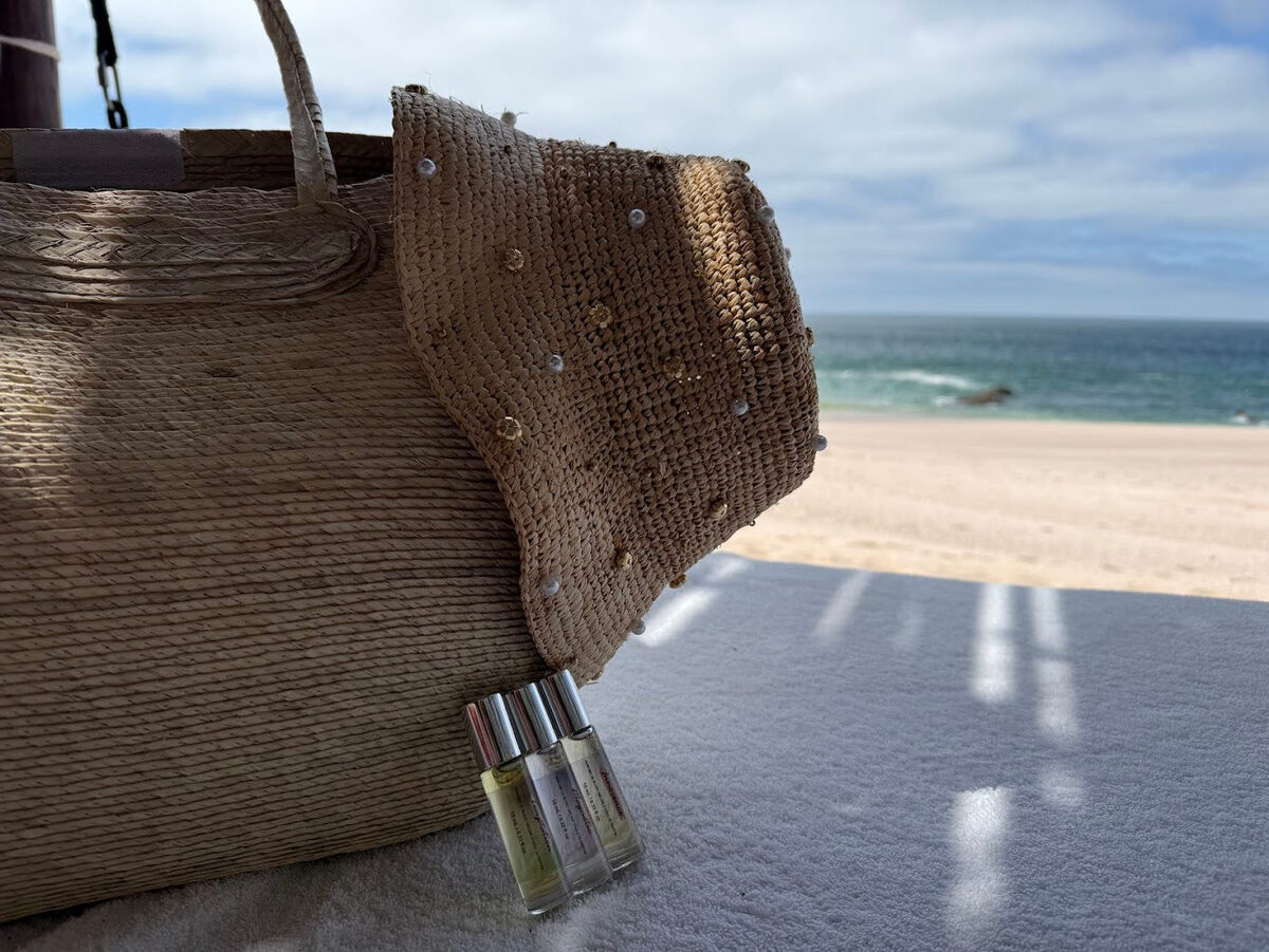 Chromelle roll-on tucked into a woven bag by the sea
